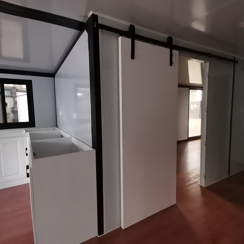40-Foot Carved Panel Expandable Container House A Stylish and Spacious Living Solution (9).jpg