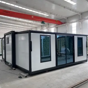 Compact and Versatile Expandable Container House